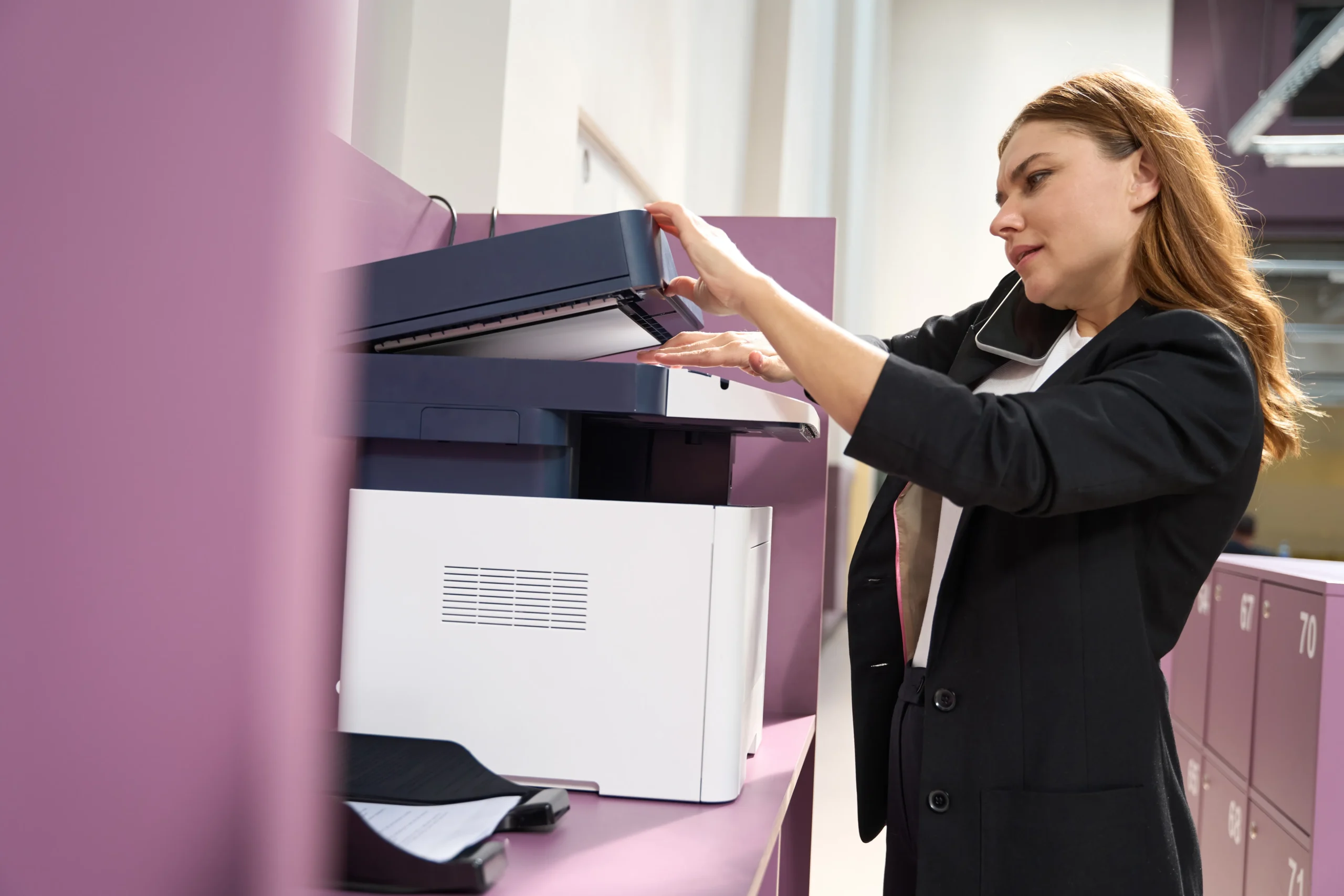 Young woman working with scanner